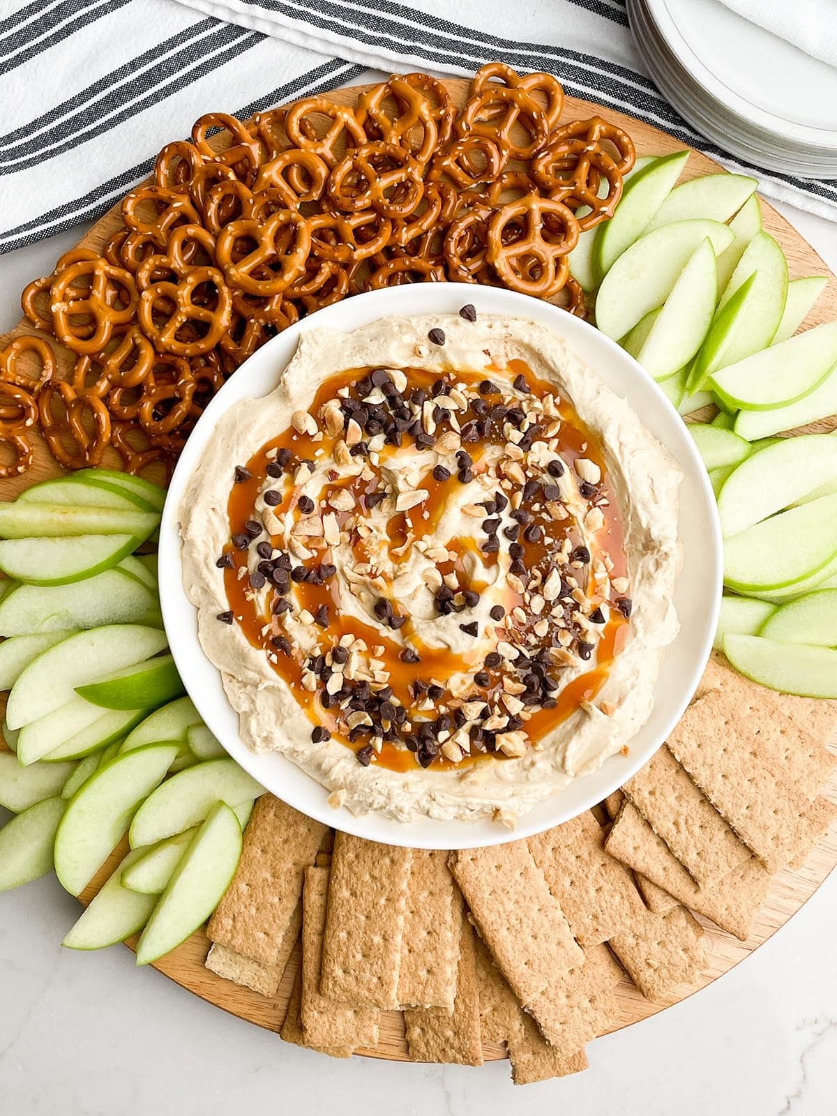 Caramel Apple Dip: Fluffy Cream Cheese Dip with Peanuts and Mini Chips